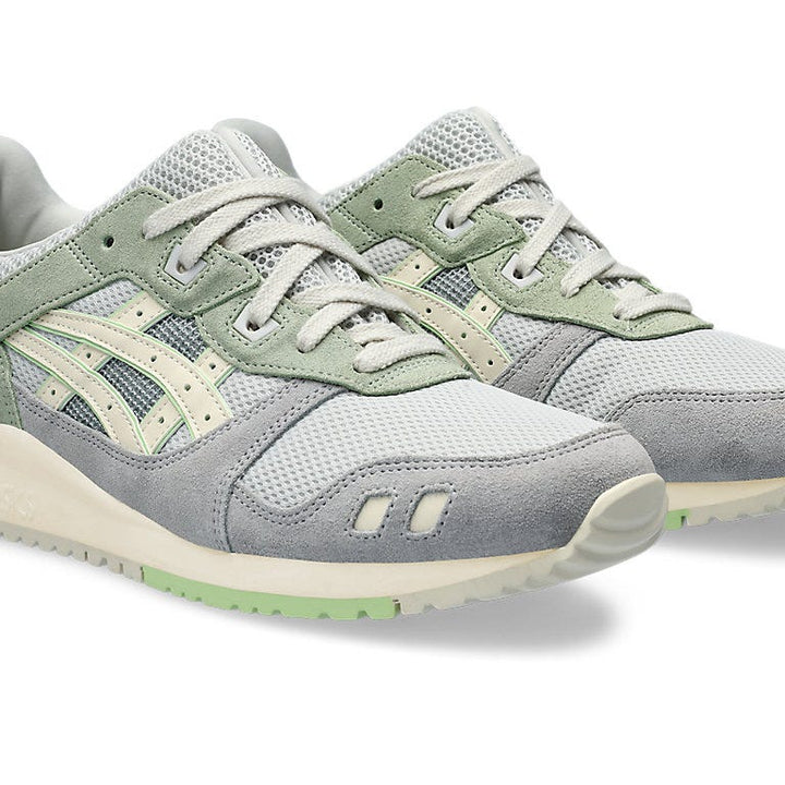 Side angle showcasing the minimalist design, lace-up details, and textured outsole.