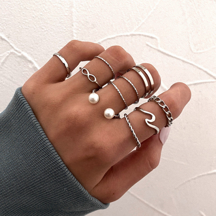 Vembley Silver Plated 10 Piece Infnity Chain Pearl Cross Ring Set For Women and Girls