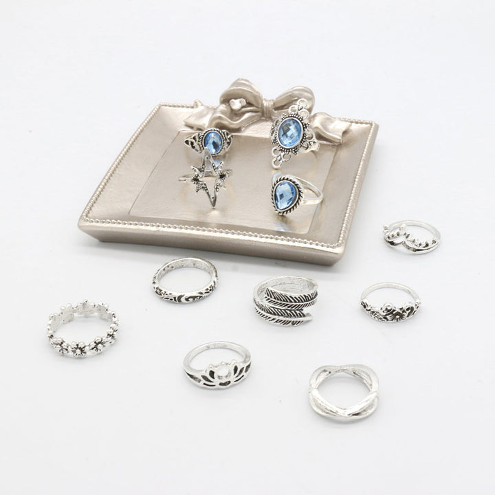 Silver Eleven Piece Star Floral Multi Designs Ring Set