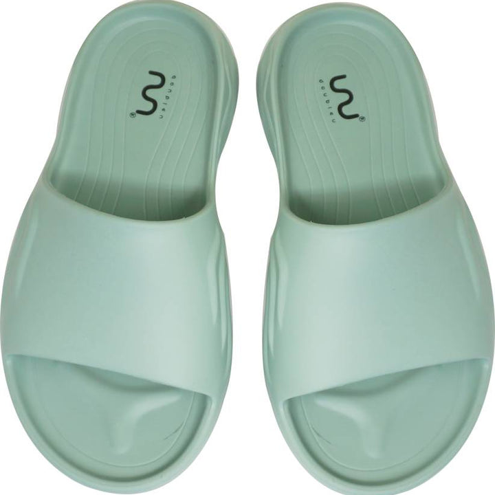 Doubleu Slide displayed from various angles, featuring adjustable straps, cushioned footbed, and stylish design