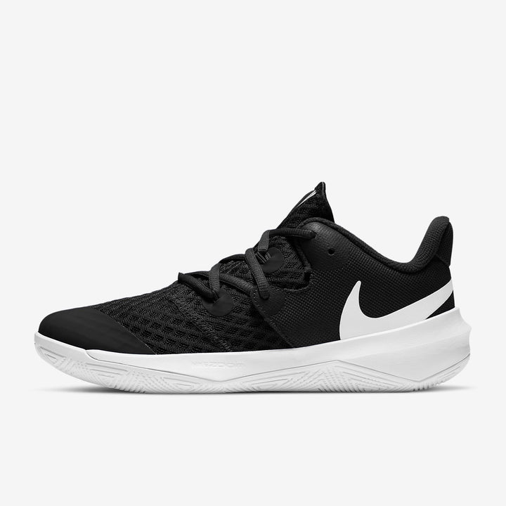 A side-angle view of Nike Zoom Hyperspeed Court women's indoor footwear showcasing the breathable upper Zoom Air cushioning and durable outsole designed for court agility placed on a clean background.