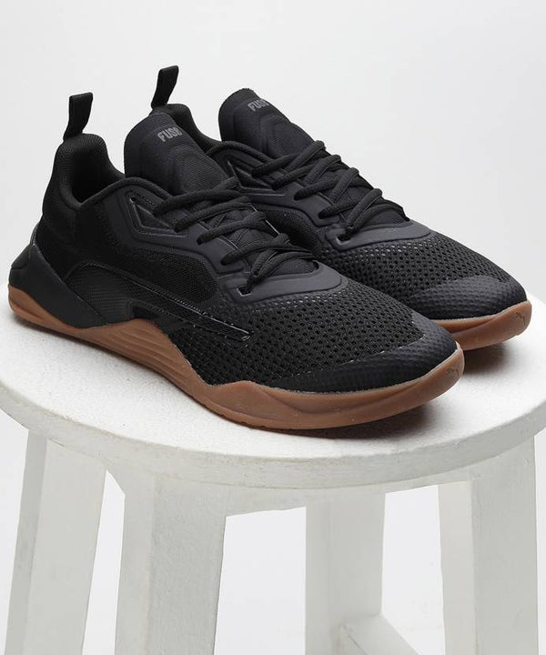 Side view of PUMA Women's Running Lace-Up Sneakers, showcasing the breathable upper, cushioned midsole, durable outsole, and iconic PUMA logo, designed for comfort and performance in running.